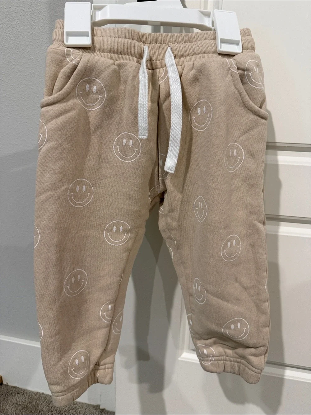 Little Bipsy Beige Joggers with White Smile Prints